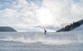 Fast going skier boy ride down the mountain hill. Active winter sport concept image Royalty Free Stock Photo