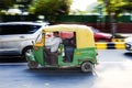 Speeding tuc tuc rickshaw car, India