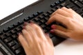 Fast hands over keyboard Royalty Free Stock Photo