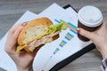 Fast junk unhealthy fat eating nutrition food concept. Top above overhead view photo of break at work. Hungry worker eating cheese Royalty Free Stock Photo