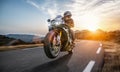 Fast motorbike on the coastal road riding. having fun driving the empty highway on a motorcycle tour journey Royalty Free Stock Photo