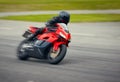 Fast motorbike racing on the race track at high speed. Royalty Free Stock Photo