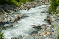 Fast mountain river Feevispa flows from Spielboden towards Saas-Fee village and Saas valley Royalty Free Stock Photo