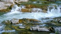 Fast mountain river flowig in cascade of waterfalls Royalty Free Stock Photo