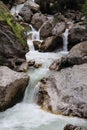 The fast mountain river which is flowing down from stones in Abkhazia