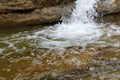 A fast mountain stream or a small mountain river Royalty Free Stock Photo
