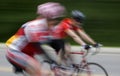 Fast Moving Cyclists - Motion Blur Royalty Free Stock Photo