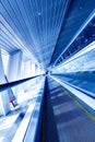 Fast moving escalator by motion Royalty Free Stock Photo