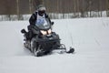 Fast moving snowmobile rider