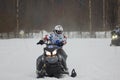 Fast moving snowmobile rider