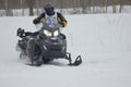 Fast moving snowmobile rider