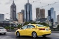 Fast moving taxi in Downtown Melbourne, Australia Royalty Free Stock Photo