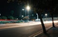 Fast moving traffic at city street at night Royalty Free Stock Photo