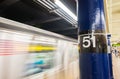 Fast moving train in New York subway. 51st street station Royalty Free Stock Photo