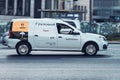 Fast moving yandex cargo taxi car on Moscow streets with blurred background