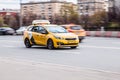 Fast moving yandex taxi car on Moscow winter streets. Taxi Yandex goes down the street Royalty Free Stock Photo