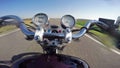 Fast riding and top speed by vintage motorcycle on the beautiful empty road. Classic cruiser/chopper forever!