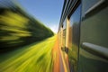 Fast riding a train with motion blur Royalty Free Stock Photo