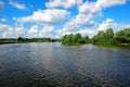 Fast river under blue sky Royalty Free Stock Photo