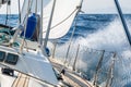 Fast sailing cruising yacht at heeling Royalty Free Stock Photo