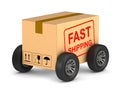 Fast shipping cargo box with wheel on white background. Isolated Royalty Free Stock Photo