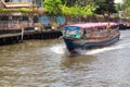 Fast speed express boat on Khlong Saen Seap river in downtown Bangkok