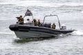 Fast speedboat of the Dutch army during an assault demo in the Port of Den Helder. The Netherlands - June 23, 2013
