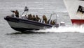 Fast speedboat with Dutch Marines during an assault demo at the Dutch Navy Days. Den Helder, Netherlands . June 23, 2013