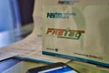 Fast Tag along with a mobile phone on the table, the application form provided by PayTM payment bank