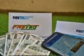 Fast Tag and its application form provided by PayTM Payment Bank on green grass