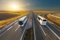 Fast travel buses on the highway at idyllic sunset Royalty Free Stock Photo