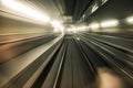 Fast underground train riding in a tunnel of the modern city Royalty Free Stock Photo