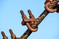 Fastening clamp on the steel cable of the bridge Royalty Free Stock Photo