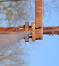 Fastening clamp on the steel cable of the bridge Royalty Free Stock Photo