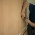 Fastening of plywood to a case, a back wall of a case, installation of a sliding wardrobe.