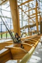 Fastening the stretch banner on a natural wood retro structure Royalty Free Stock Photo