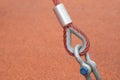 Fastening textile rope with a crimp to the metal loop. Tross with aluminum crimp clutch attached to a steel loop. Tensioned sling