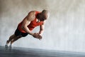 Faster, harder, stronger. Shot of a man doing exercises at the gym.