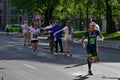 Riga, Latvia - May 19 2019: Fastest runners arriving to first refreshment point