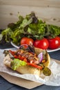 Fastfood: hot dog with sausage and vegetables Royalty Free Stock Photo