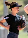 Fastpitch softball player focused on the game Royalty Free Stock Photo