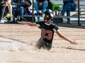 Fastpitch softball player focused on the game Royalty Free Stock Photo