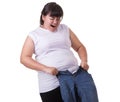 Fat asian woman trying to wear small size jeans isolated on whit Royalty Free Stock Photo