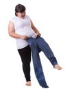 Fat asian woman trying to wear small size jeans isolated on whit Royalty Free Stock Photo
