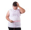 Fat Asian woman wear white t-shirt and checking her body size wi Royalty Free Stock Photo