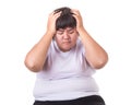 Fat Asian woman wear white t-shirt worried about her body size Royalty Free Stock Photo