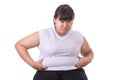 Fat Asian woman wear white t-shirt worried about her body size Royalty Free Stock Photo