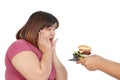Fat Asian woman wearing exercise clothes to lose weight, happy posture, someone gave her hamburger. Royalty Free Stock Photo