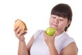 Fat asian woman wearing white t-shirt and choosing to eat fried Royalty Free Stock Photo