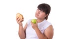 Fat asian woman wearing white t-shirt and choosing to eat fried Royalty Free Stock Photo